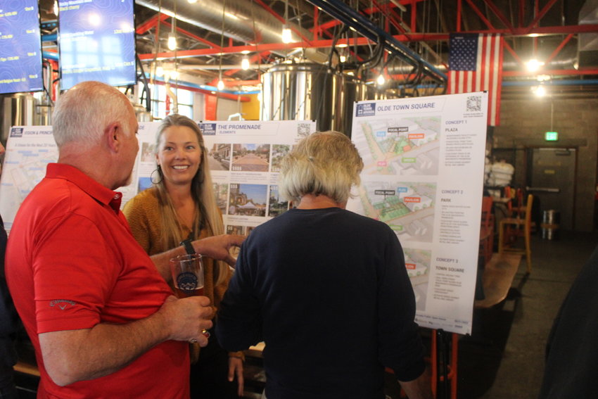 A representative from Dig Studio speaks with community members at the City of Arvada's Sept. 21 open house on the future of Olde Town.